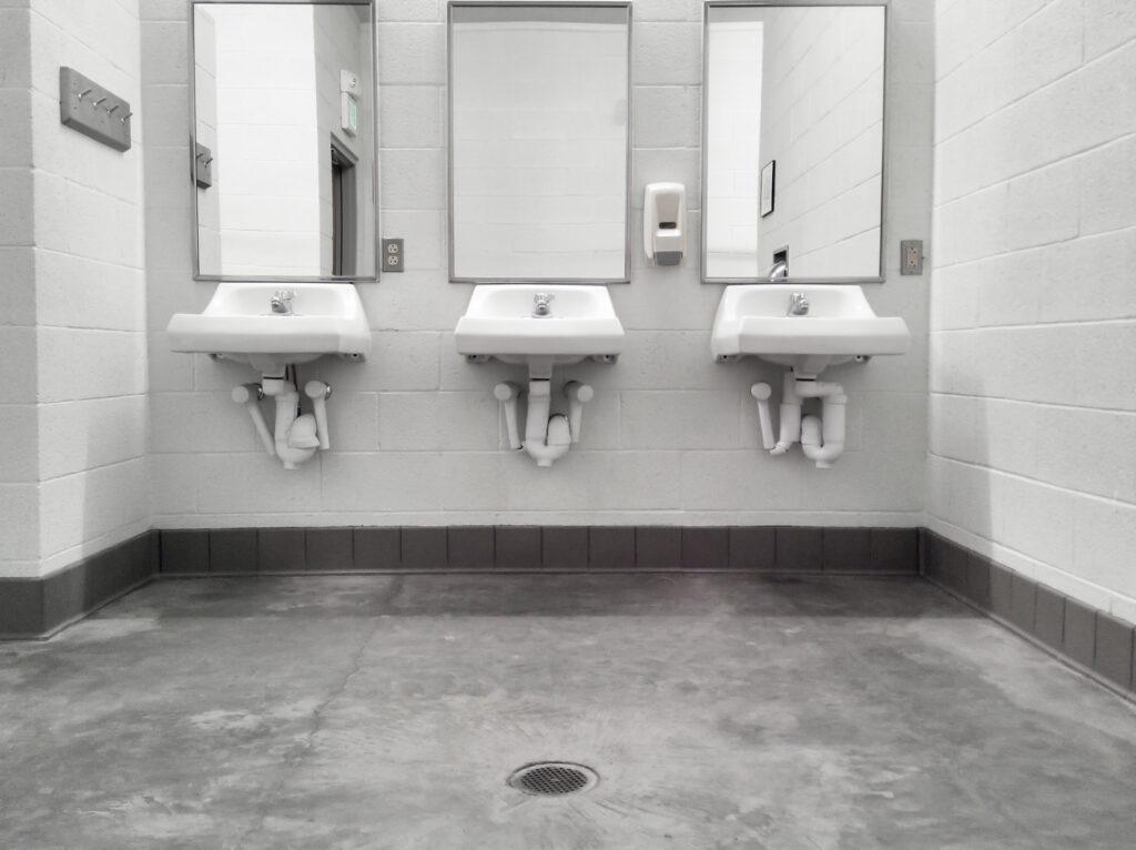 Clean simple public washroom sinks mirrors