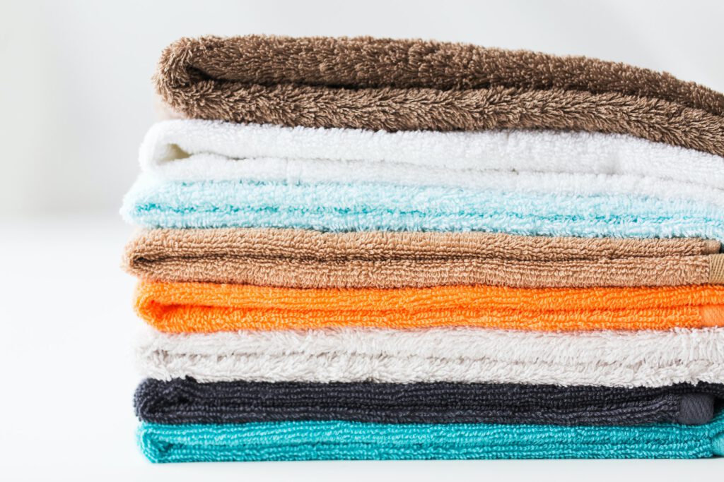 close up of stacked bath towels