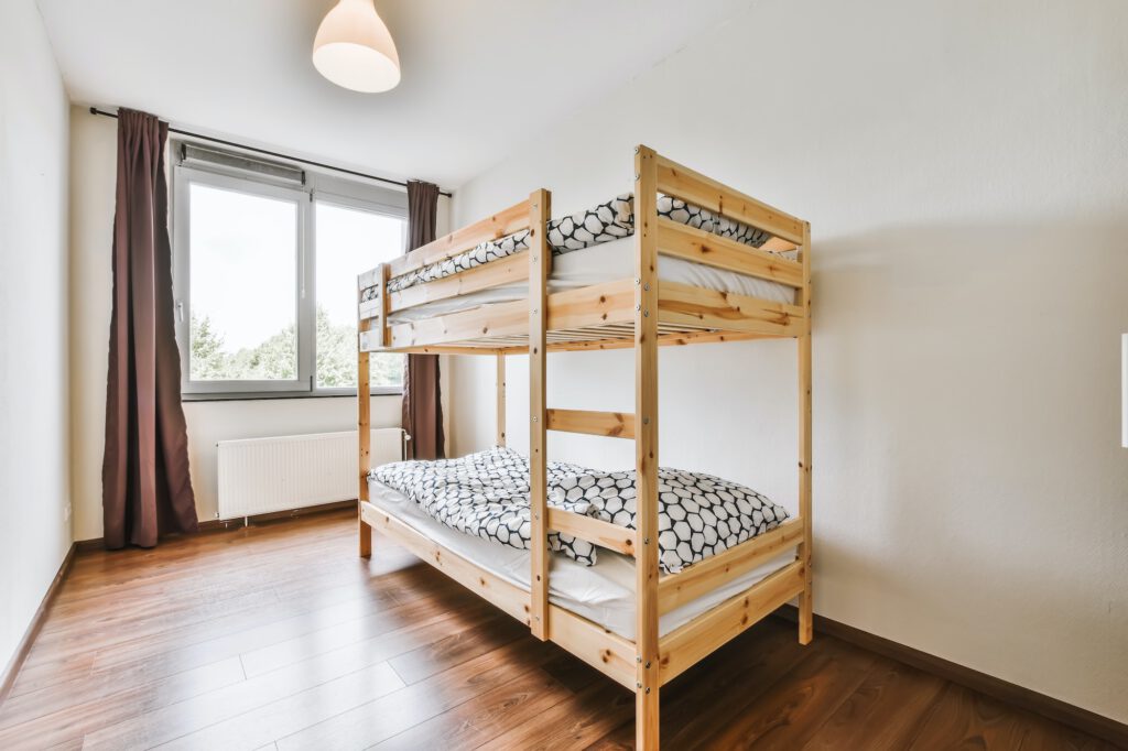 Lovely bedroom with wooden bunk bed